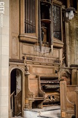 PHOTO BY MARK CHAMBERLIN - The organ inside the 1912 chapel in Mount Hope Cemetery has deteriorated beyond use. The chapel has been out of use for decades
