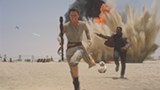 PHOTO COURTESY WALT DISNEY STUDIOS - Daisy Ridley, John Boyega, and BB-8 escape a First Order - attack in "Star Wars: Episode VII -- The Force Awakens."