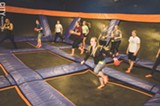 PHOTO BY MARK CHAMBERLIN - Teams square off at Sky Zone during a game of trampoline dodgeball.