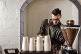 PHOTO BY MARK CHAMBERLIN - Ugly Duck Coffee owner Rory Van Grol slings espresso at Fiorella during a pop-up coffee bar last week.