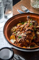 PHOTO BY MARK CHAMBERLIN - Roux takes a classical approach to French cuisine, with dishes like the chicken tagine.