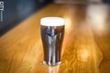 PHOTO BY KEVIN FULLER - The brewery's signature beer is an Irish stout that is made using nitrogen rather than carbon dioxide, creating a smoother, creamier taste.