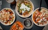 PHOTO BY RYAN WILLIAMSON - At Naan-Tastic, diners can customize bowls, rolls, or Naan-tacos. From left: The college bowl, (top) Naan taco with lamb keema, (right) bowl with vegan chana masala, and (bottom) Makhani Samosa.