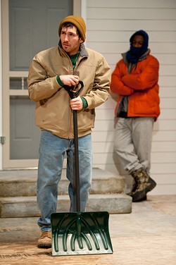 Walter (senior W. Spencer Klubben,), left and Matthew (junior Shaquill McCullers,) meet for the first time while shoveling snow outside their apartments in the University of Rochester Todd Theatre's production of "The Rochester Plays." PHOTO BY J. ADAM FENSTER / UNIVERSITY OF ROCHESTER - PHOTO BY J. ADAM FENSTER / UNIVERSITY OF ROCHESTER