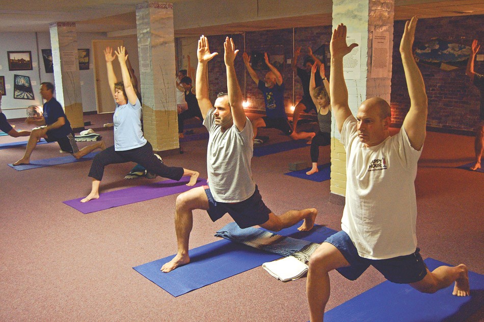Yoga is taught at many area gyms, including Downtown Fitness Club (pictured). - FILE PHOTO